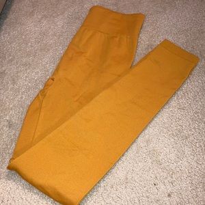 Women’s fleece lined leggings. Mustard in color.